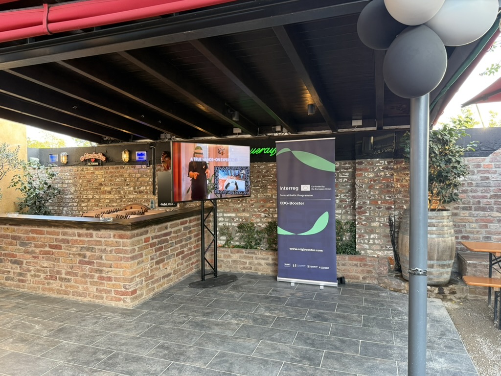 CDG-Booster project roll-up at a conference